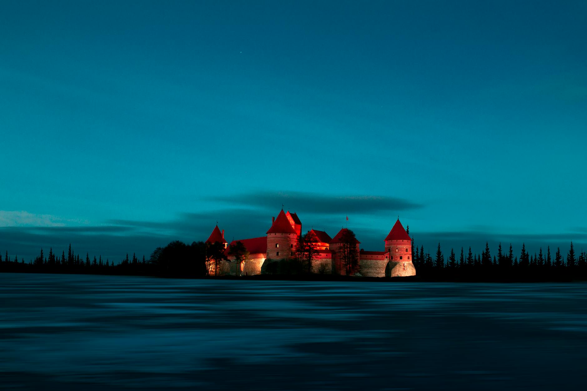 structural photography of castle during nighttime